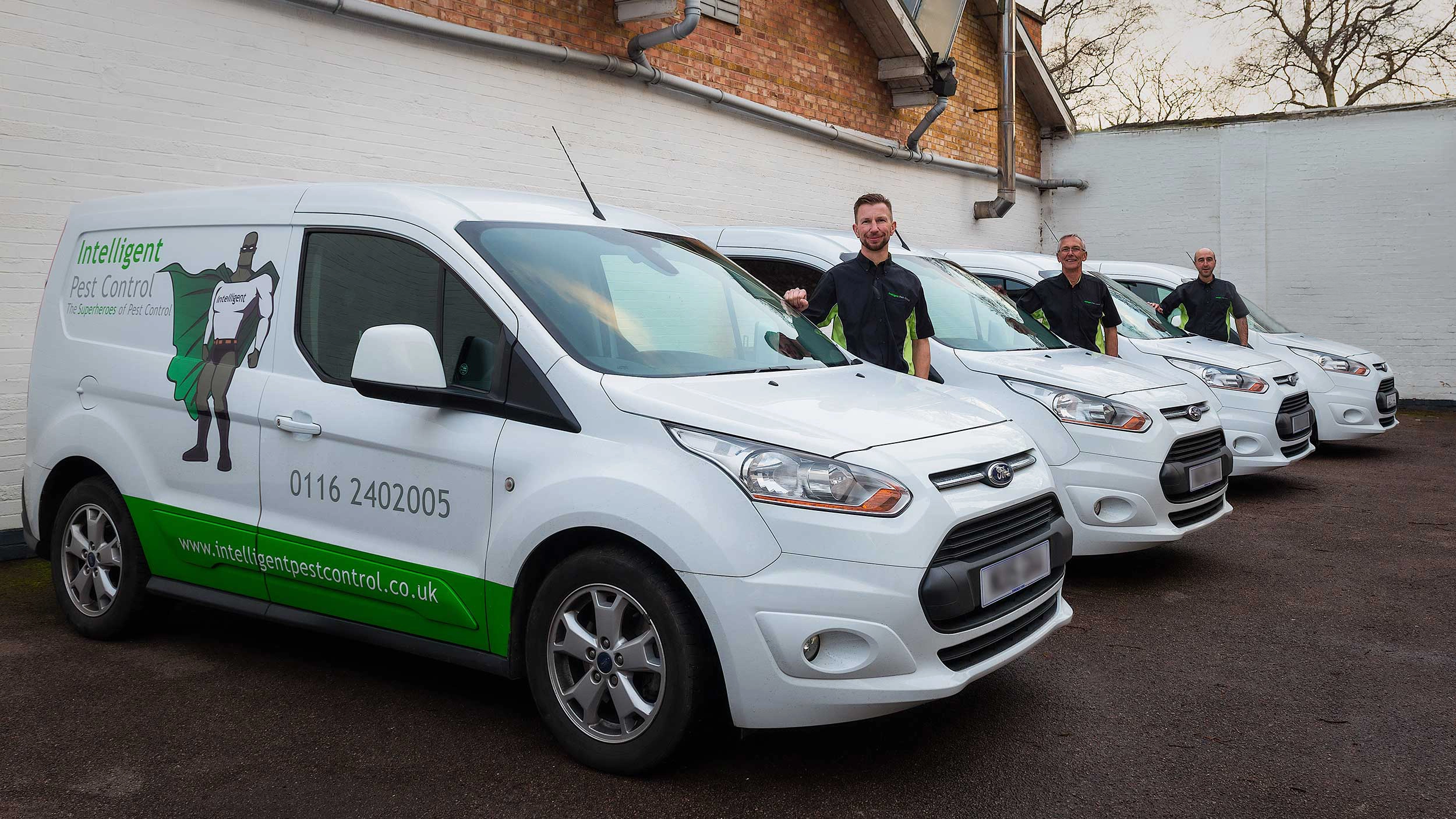 The Intelligent Pest Control team with their vans